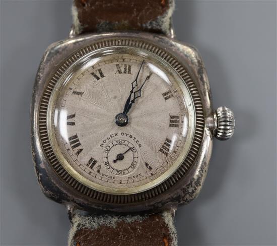 A gentlemans silver Rolex Oyster cushion cased wristwatch, with silvered Roman dial and